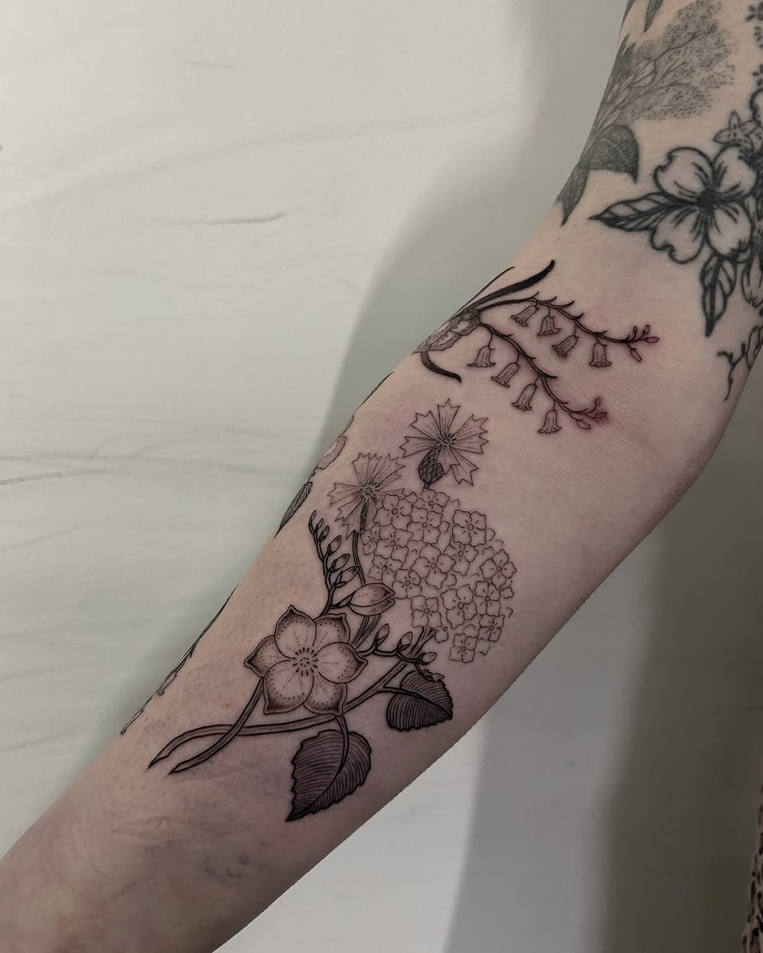 Added more florals to Katherines arm garden 💐 what a pleasure it is to of tattooed you over the years! Upcoming availability in London-  Thursday 20th March
Thursday 10th April
Thursday 17th April  I am also doing custom and £90 flash at @tattoofestuk 5-6th APRIL I will be releasing designs once I have drawn them next week 🌹