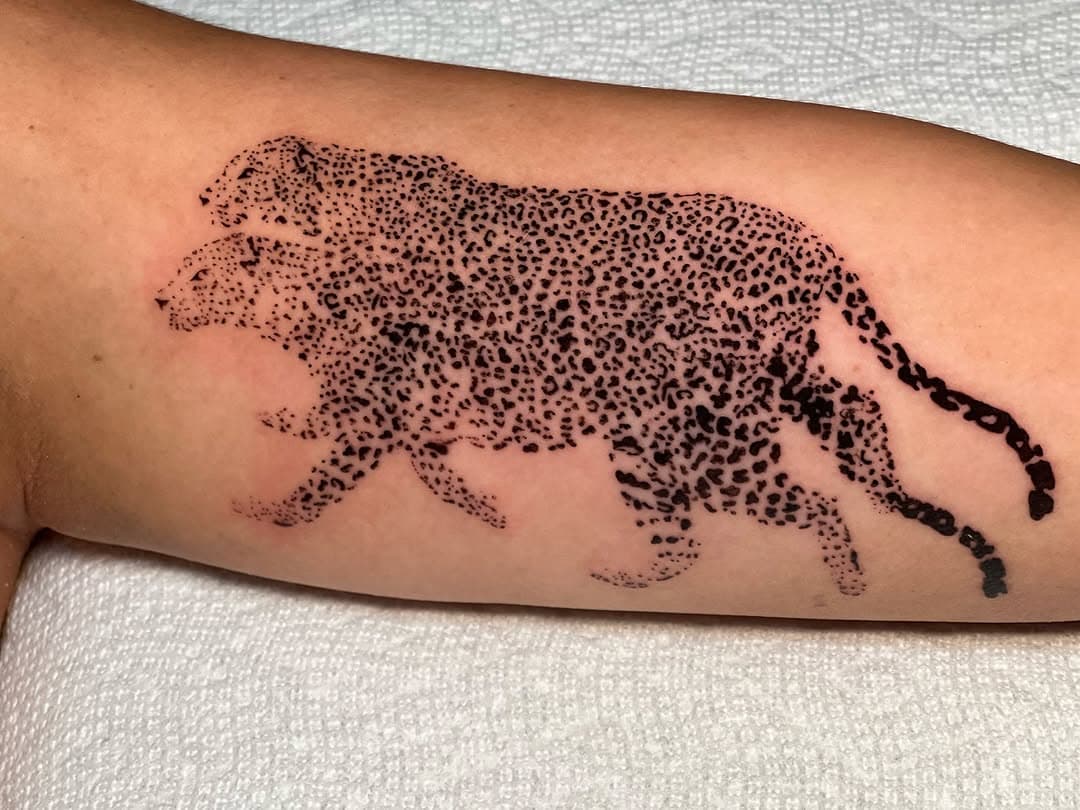 I think I’ll never fear another stencil after this one. This tattoo is a striking and intricate design of two overlapping leopards, their forms blending into each other through a pattern of carefully placed black dots and rosettes. The optical illusion effect creates a sense of movement, as if the leopards are both existing in the same space yet slightly out of sync, a visual representation of duality and layered perspectives. I was never a tragedy, just a disappointment—another person who made promises I had no intention of keeping, who left behind not devastation, but regret. No one loses sleep over me anymore; I am just the quiet wince when my name is mentioned, the bitter aftertaste of misplaced trust. They don’t mourn me, they resent ever believing I was worth mourning. And I live with that, the dull, inescapable truth that in the end, I was not unforgettable—I was just a mistake. The dotwork technique gives the piece a raw yet refined texture, making it as much an abstract work of art as a depiction of the powerful animal.

#tattoo #tattoos #linetattoo #lineworktattoo #linework #blacktattoo #blackworktattoo #blackwork #finelinetattoo #finelinetattoos #texastattoo #texastattoos #texastattooartist #dfwtattoo #dfwtattoos #dfwtattooartist #dallastattoo #dallastattoos #dallastattooartist #fortworthtattoo #fortworthtattoos #fortworthtattooartist #dallas #fortworth #denton #leopard #abstracttattoo