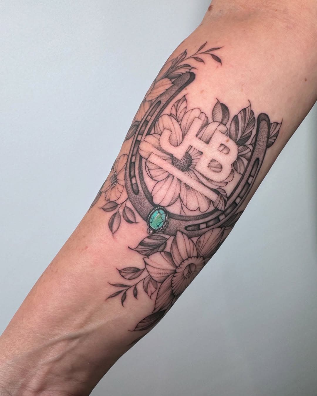 A special tattoo for her grandparents who were married for 74 years. We incorporated their birth flowers, their family brand used on their cattle, horseshoe because her grandpa would make art out of them and her Grandpa’s turquoise ring given to her. Thank you Desiree! 

#sandiegotattoo #sandiegotattooartist #sandiegotattooshop #vesseltattoo #tattoo #tattooartist #brand #cattlebrand #horseshoetattoo #horseshoe #turquoise #turquoisejewelry #floraltattoo #floraltattooartist #flowertattoo