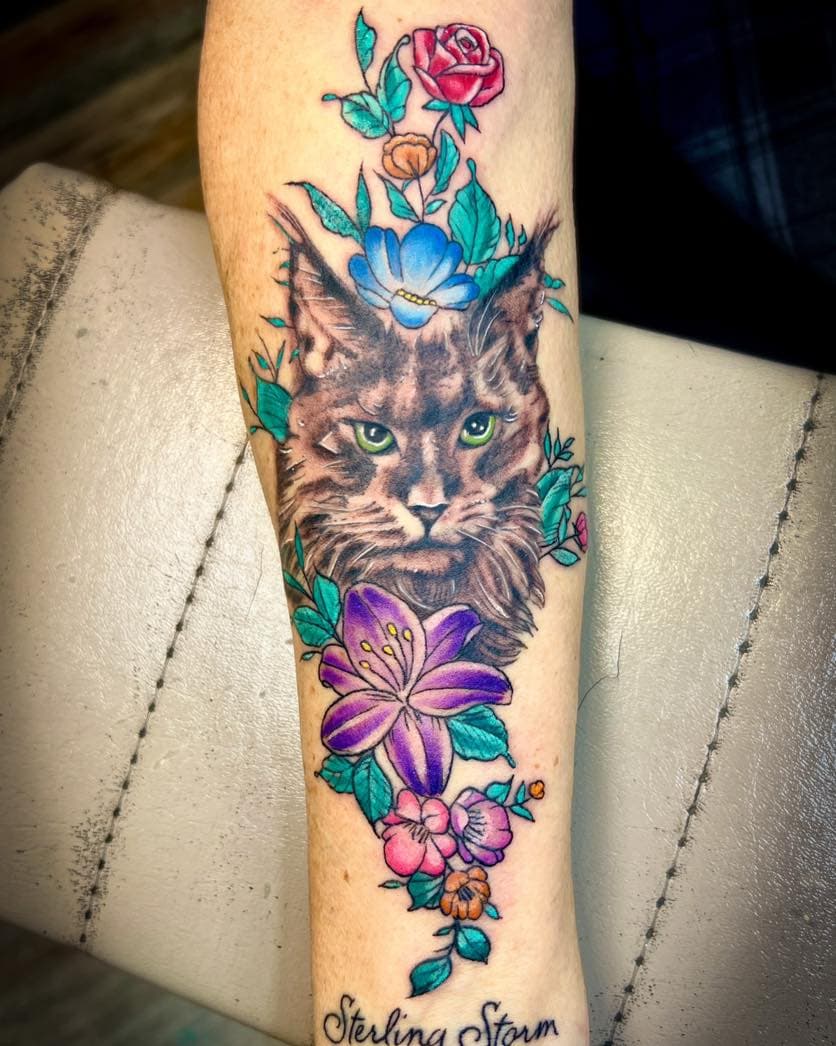 🗣️Customers wanted. Just finished the beautiful main coon portrait with 🌺 flowers. If you are looking for solid Tattoo work please comment or DM us. Thank you. 🙏🏻