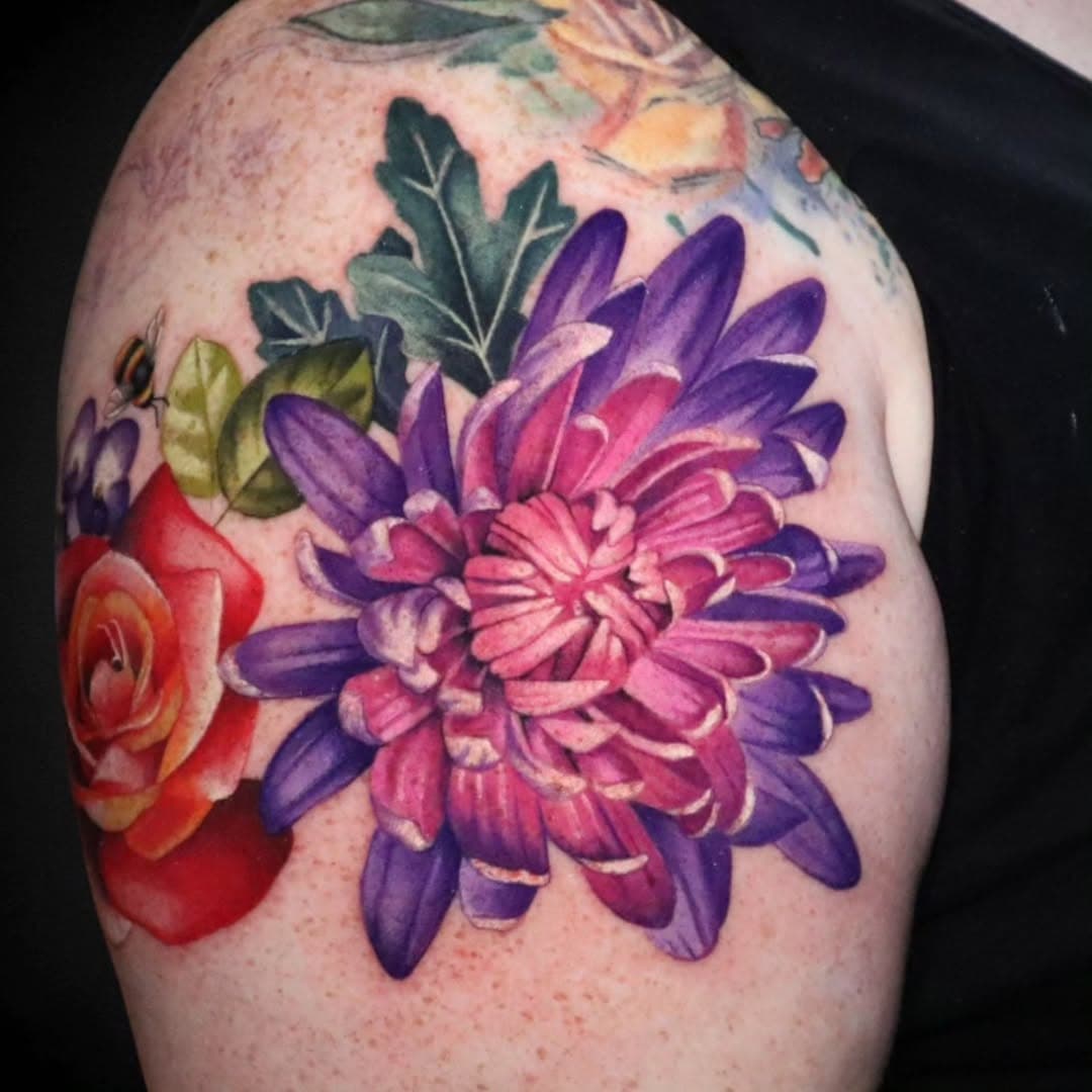 Chrysanthemum on Amy ❤️ This took 3 hours to complete 🙌 
.
#Chrysanthemum #flowerpower #flowertattoo #purple #botanicaltattoo ##tattooidea #colorrealism #realismtattoo #floralartist #wisconsintattooartist