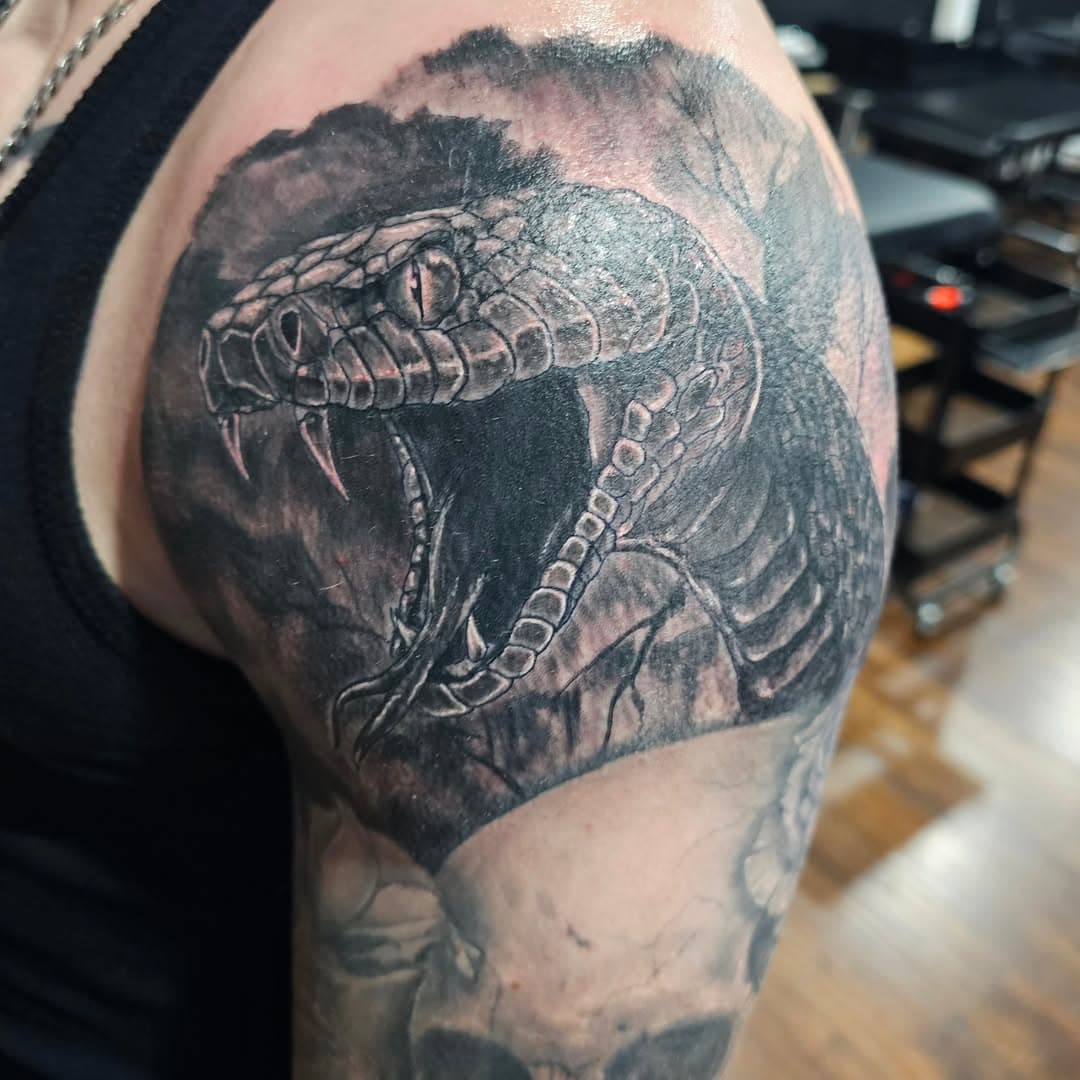 Added some more to this sleeve. More like this please #jacksonvillenc #ncartist #onslowcountync #camplejeune #cherrypointnc #swansboronc #topsailisland #blackandgreytattoo #marinetattoo #blackandgraytattoo #tattooinjacksonvillenc #tattooinjacksonville #emeraldislenc #ultramegasupreme #snaketattoo