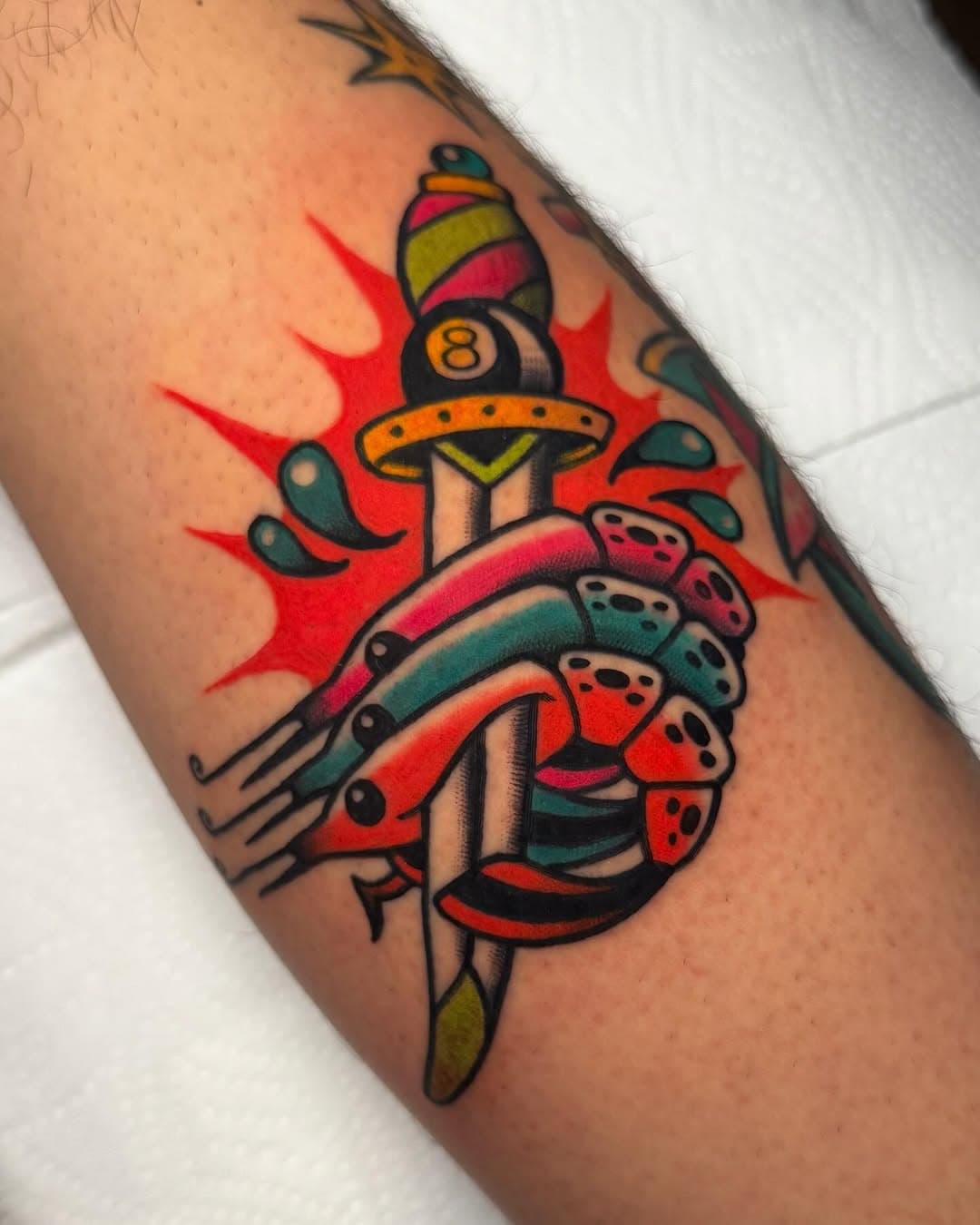 one order of shrimp special for my little brother @xavier_bda - can you believe this kid has two tattoo artist siblings? Had a blast zapping the kid’s leg and experiencing some smooooth jazz vibes in the evening. Nice to be able to share some London Magic™️ with the fam 🎷🦐🌙✨❣️

🗓️ Booking for: February & Beyond • London UK/ BERMUDA @hightidebda MARCH/APRIL

🔗 Link to Book an appointment in bio
🌻 home base: @kingscrosstattoo
💖 custom requests welcome
🎱 100’s of flash designs in FLASH highlight

💌 DM or email info@kingscrosstattooparlour.com for more info or to begin the booking process 🪄

🌈🤡💅🏻 Interested in having this clown in your city? Get in touch for guest spots. 

☻

 #prawntattoo #shrimptattoo #weirdtattoo #dagger #daggertattoo #traditionaldagger #siblings  #veganlondon #queerlondon #bright_and_bold #londontattooartist #londontattooers #londontattoo #qttr #queerartist #queertattooartist #vegantattooartist #permanentdaydreams #permanentdaydreamstattoo