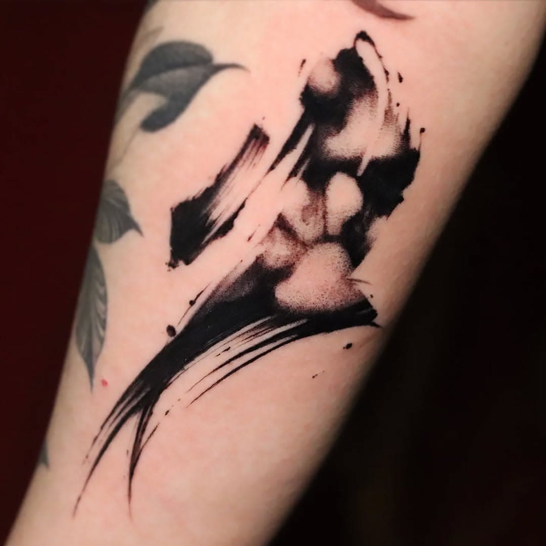 Irene's bb paw print inside brushstroke