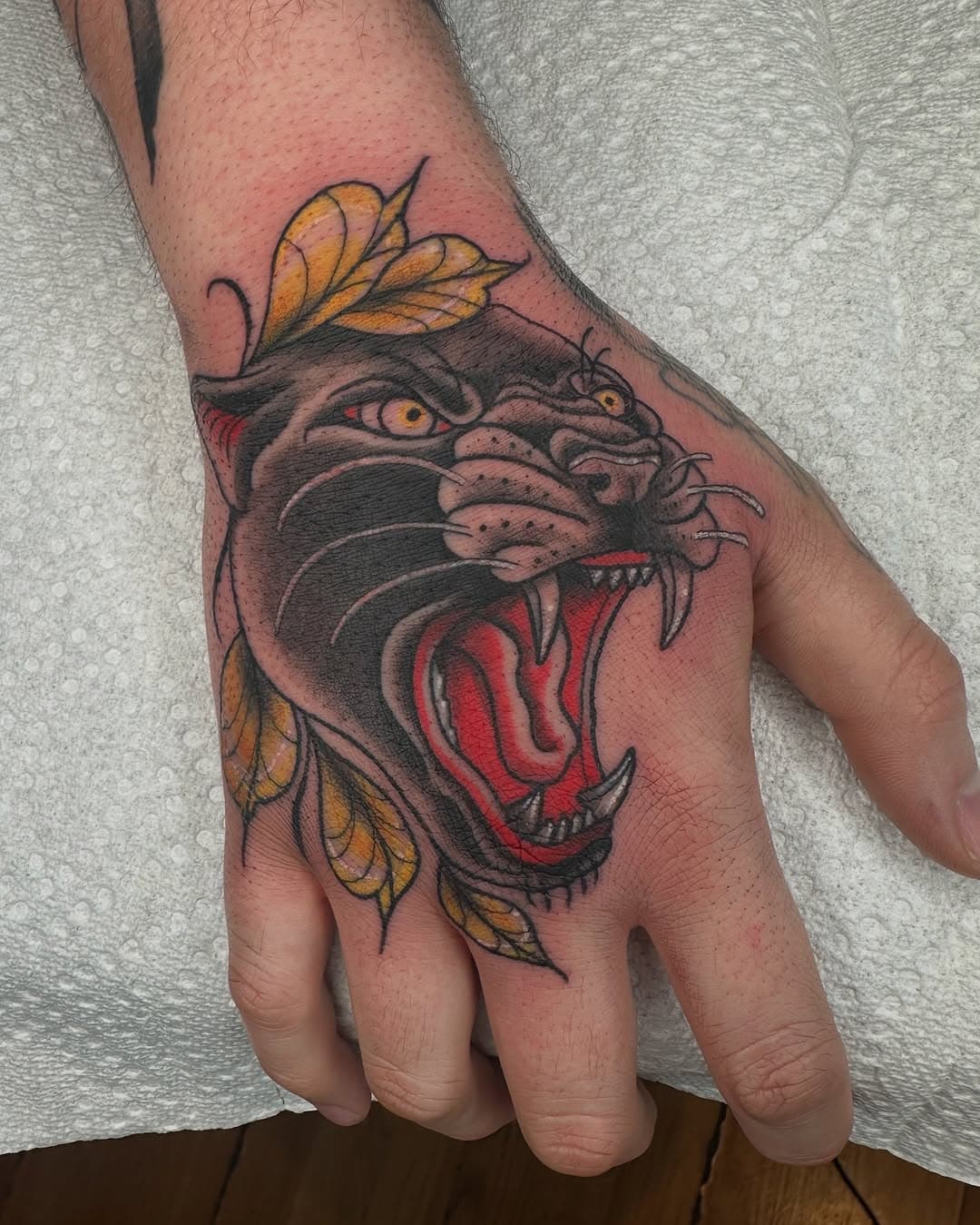 Panther head job stopper, as it should be. Thanks Ryan, u rule. Now booking for end of March and April! 

Done @spellbound_tattoos 
Using @crybabytattooproducts stencil bond
  @eternalink for color
  @worldfamousink legendary outlining ink
  @inkeeze pink glide
  @dragonhawkofficial mast fold pro ⚡️

#nowbooking #custom #customtattoo #neotrad #neotraditional #pantherhead #jobstopper #handtattoo #coloradotattoo #coloradotattooartist #panther #pueblotattoo #pueblotattooartist #spellboundtattoo #crybabytattooproducts #dragonhawktattoosupply #eternalink #worldfamousink #inkeeze @worldofneotrad