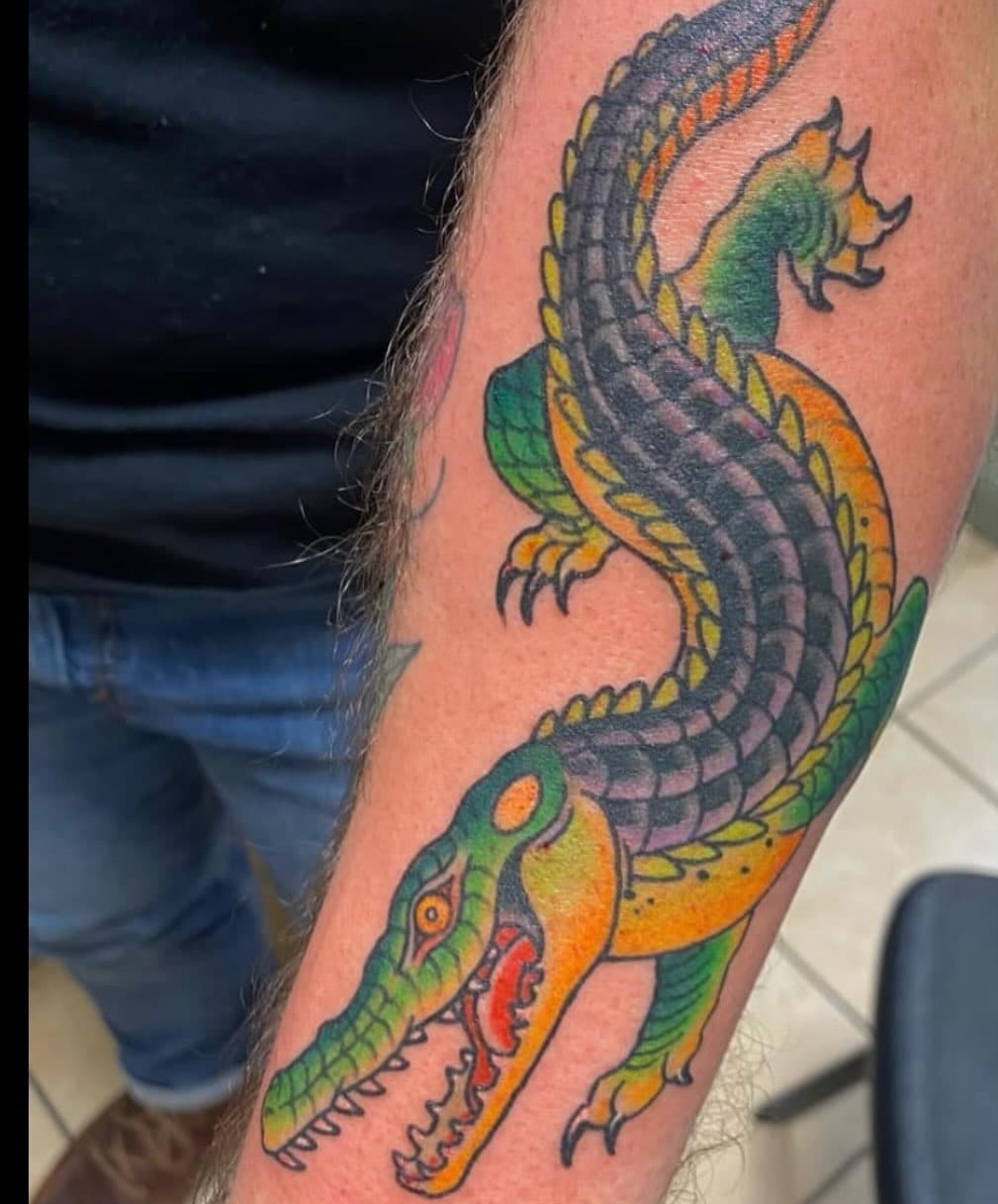 Beautiful Alligator by @colinpmcclain.
If you love bright and bold tattoos come see us!
We’ve got appointment availability in the month of April...
Don’t forget walk-ins are welcome too!

DM this page to book your next tattoo with us! 
@jasonprofant @jonathannashtattoo @colinpmcclain
@yelahtattoos @titanosaurusrex
@permanent.makeup.by.jess

#snaketattoo #tattooshop #tattoo #tattooart
#tattooideas #headtattoo #ouch #tough #indiana #midwest #bloom #bloomington #iu #indianauniversity #art #artistsoninstagram #tattooer