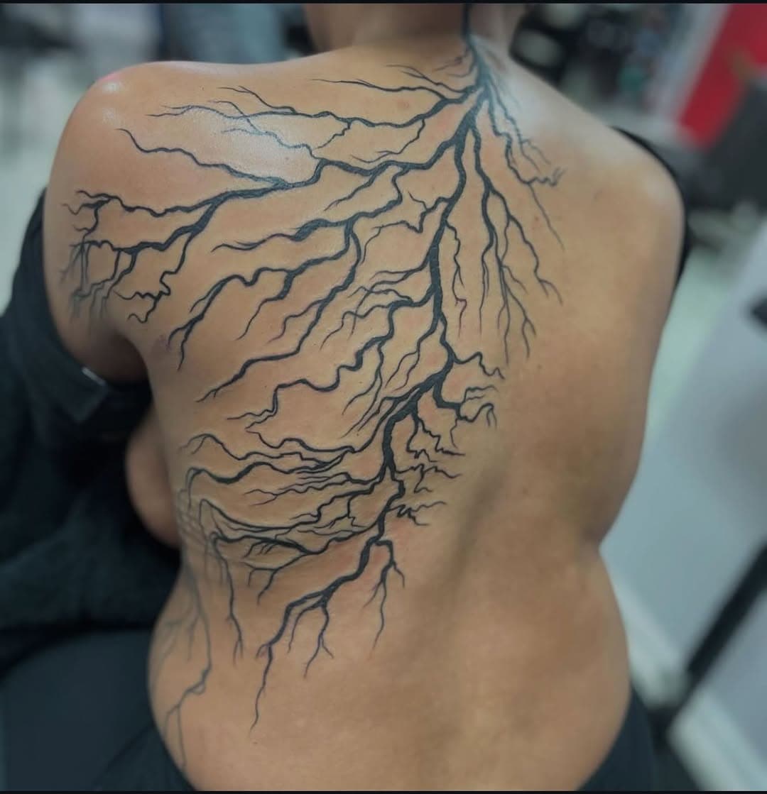 Incredible lightning-inspired back piece by Rachel! ⚡🖤 This one is pure power and precision. She’s taking walk-ins and booking appointments for March—don’t miss out! DM or call to schedule. 📍13520 Perkins Rd. (Off Siegen Ln. by the St. George Fire Dept.) 224.223.6477 ☎️ #tattoo #ink #tattoos #inked #tattooer #inkedup #tattooing #inklife #tattooist #art #tattoolife #bodyart #tattooshop #piercings #tattooartist #bodypiercings #tattoostudio #BatonRouge #tattooedlifestyle #getinked #sacredarttattoo #Louisiana #shoplife #gettattooed #sacredarttattoostudio #LSU #blackandgreytattoo #geauxbr