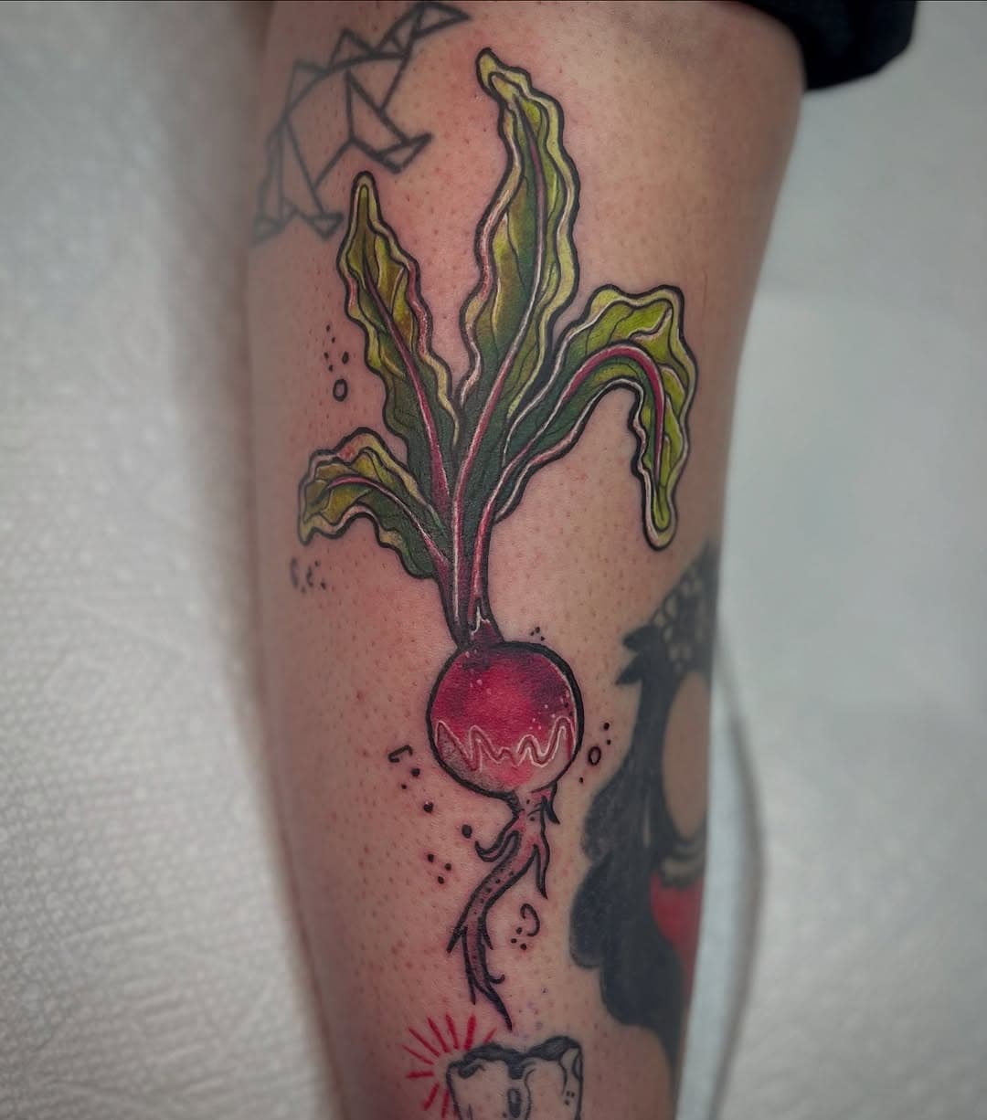 Now that’s one rad(ish) tattoo! Can’t beet a fun walk-in like this 🥔🍠🫚!! 
-
I was absolutely delighted to get to tattoo this fun flash design the other day! Thanks so much for coming in 🥰✨
-
-
#veggie #vegetabletattoo #colortattoo #lgbtqtattooartist #queertattooartist #cincinnatitattoo #ohiotattoo #ohiotattooartist
