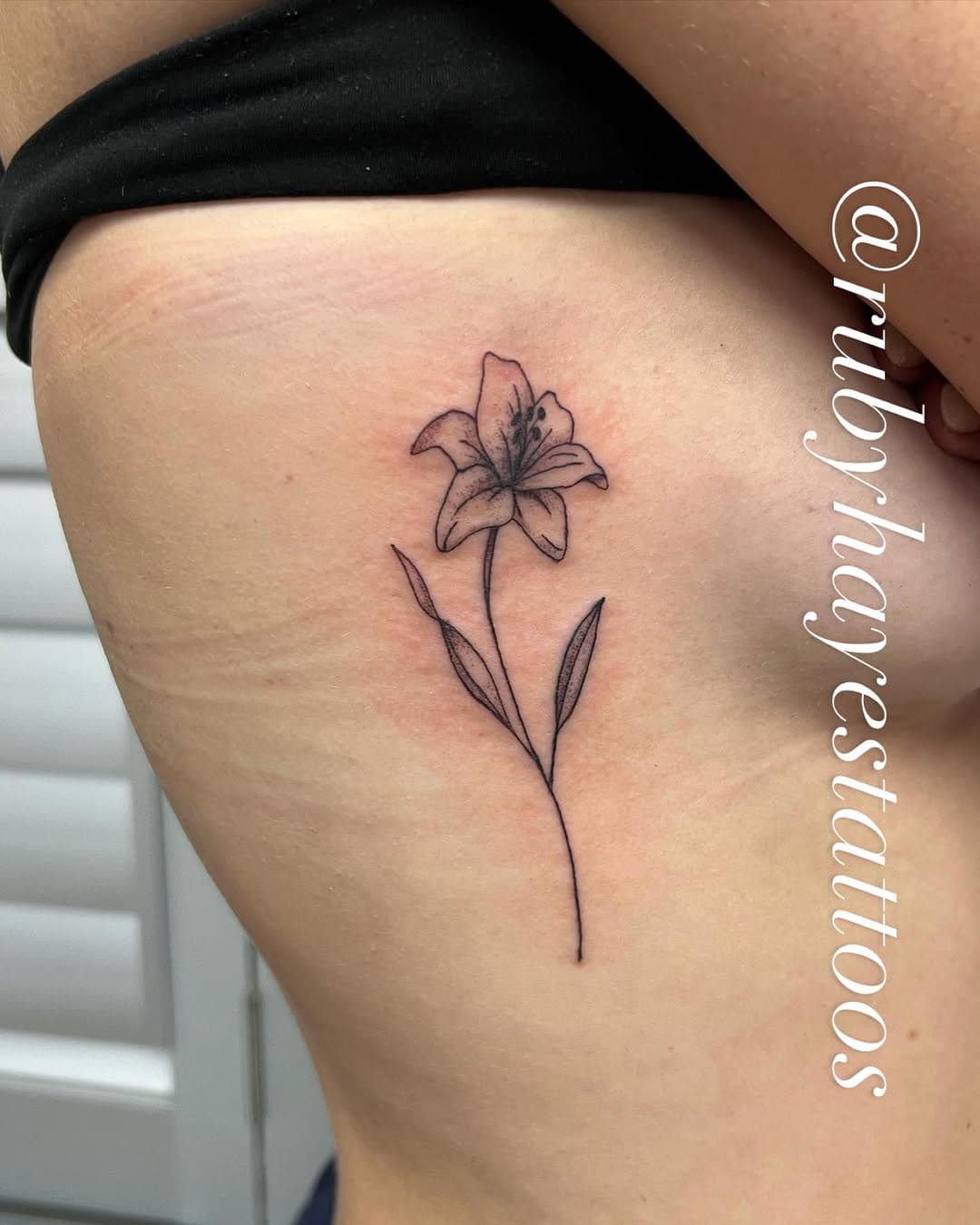 Lily 🌸 @rubyhayestattoos #purplehazetattoos #purplehazetattoosbeaconsfield #tattoos #tattooideas #rubyhayestattoos #beaconsfieldtatoos #tatts #purplehazetattoos #purplehazetattoosbeaconsfield #tattoos #tattooideas #rubyhayestattoos #beaconsfieldtatoos #tatts #lily #lilytattoo #flowertattoo