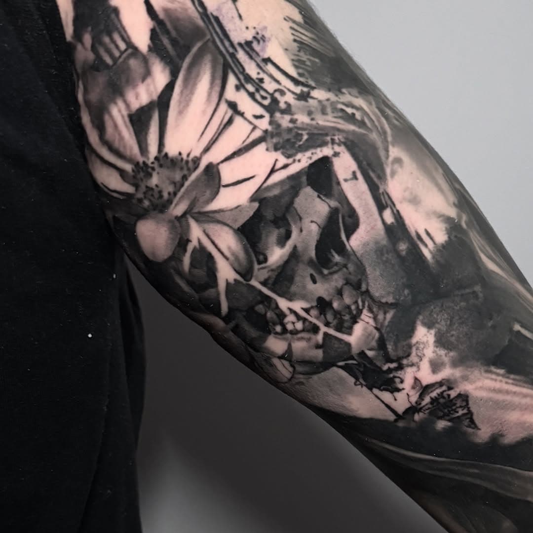 Filling in odd gaps on sleeves doesn’t have to be boring. Often time I see these gaps filled with smoke or clouds. This client wanted some more interesting so we added the skull and flower to fill the space.