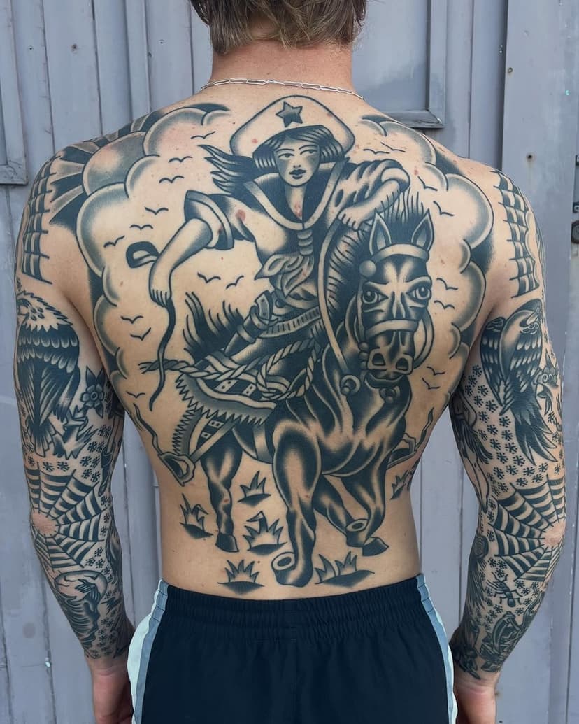 Tom’s back healed and settled from last year and a fresh rock of ages on the ribs. Thank you for your commitment and total trust! @alfredstreettattoo Dm to book in 🌴📕