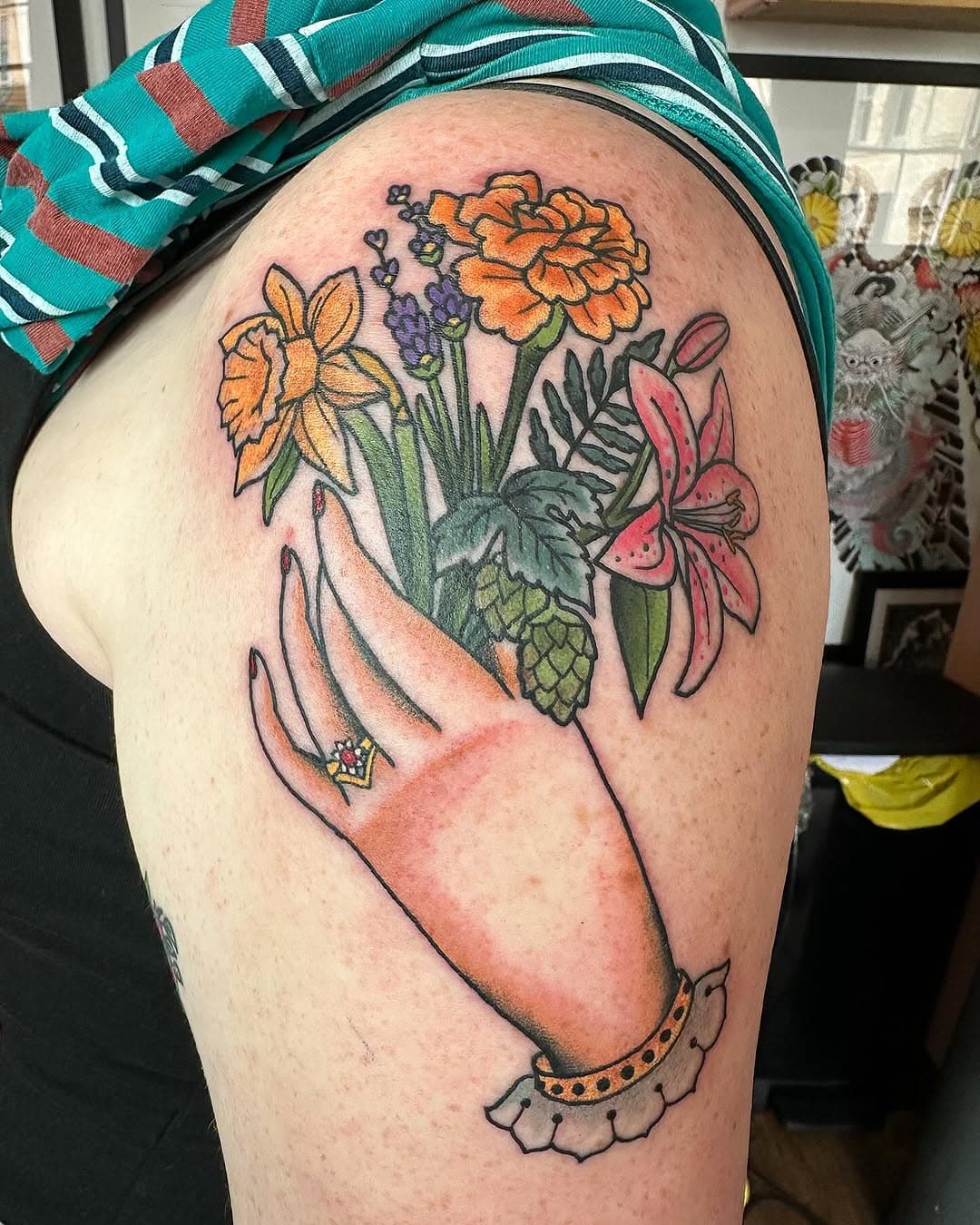 Hand with florals for Freya 💛daffodil/cosmos/hops/lavender and Lillies done @bloomstreettattoo #manchestertattoo #manchestertattooist #manchestertattooer #tattoo #traditionaltattoo #tradtattoo #floraltattoo #floraltattoos #botanicaltattoo #flowertattoo #oldlines #neotradtattoo #neotraditionaltattoo #bright_and_bold  #tradworkers