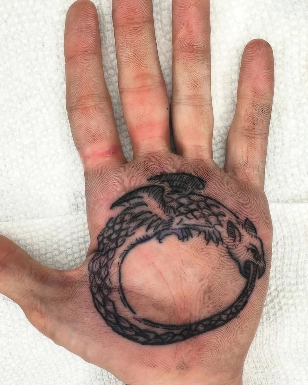 Palm tattoo 

By @sadkattats