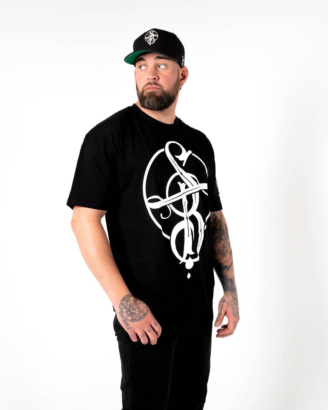 An icon in every sense. The Steve Butcher Icon Tee ⚡️ Where art meets legacy. Clean, bold, and built to last. 

Wearing a 2XL tee in this shoot 👏

Available now—link in bio. 

#TattooedAndSuccessful #SteveButcher