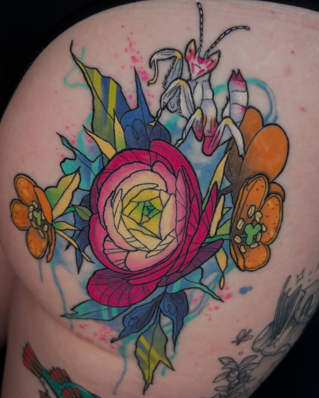 ✶ HEALED ✶ cutest ever orchid mantis cheeky tattoo! Thanks for healing so well!!! This is from my super cool design book ✨ 💋🌈 I love doing bright colored tattoos for you all. Thank you for trusting me with your skins 🥰