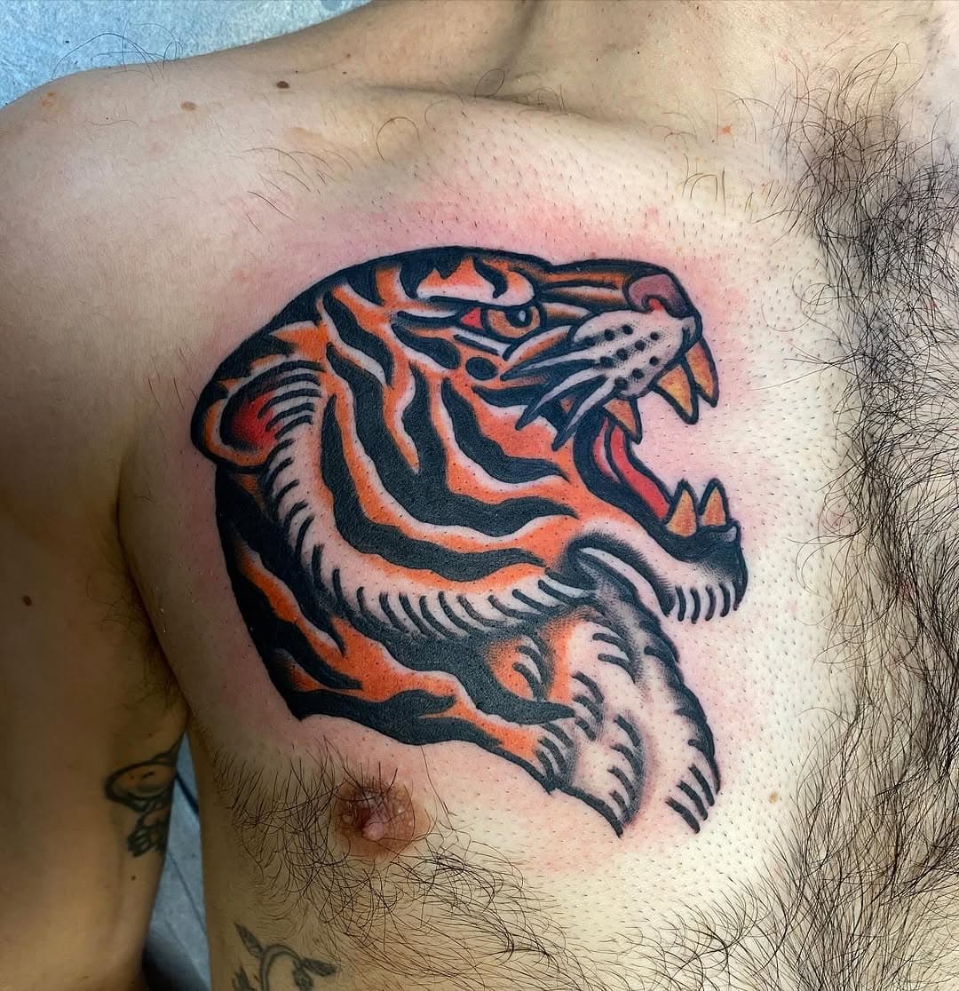 Chest tiger from recent
I still have some openings for April, if you’re interested in setting something up, please send me an email joeljaniszyn@gmail.com

#tradworkers #oldlines #bright_and_bold #skinart_traditional #top_class_tattooing #tattooer #traditionalart #boldwillhold #boldtattooart #oldworkers #traditionaltattoo #americantraditional #tradworkers #tattoosnob #classictattoo #traditional #tradtattoos #tattoos #tigertattoo #traditionaltiger