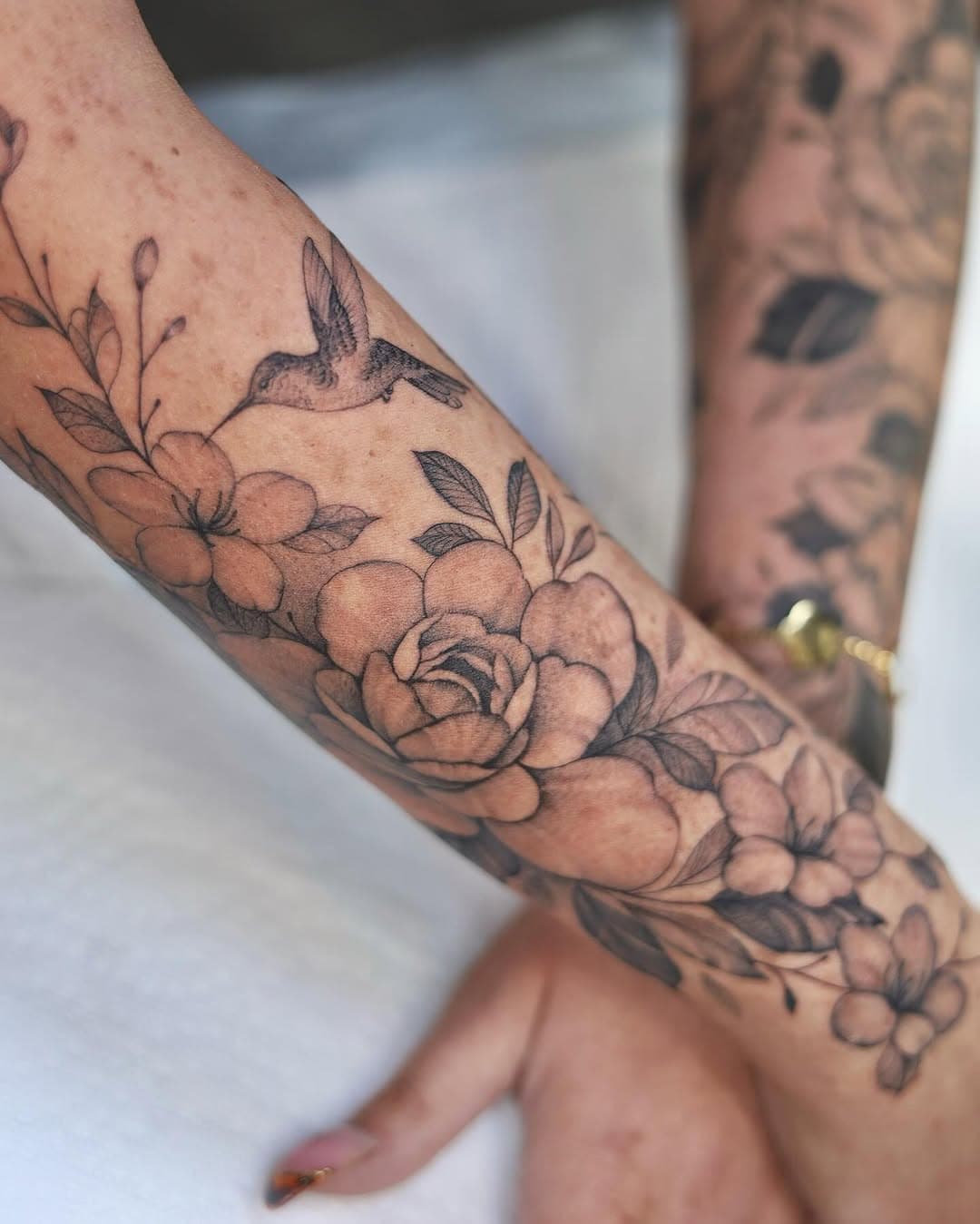 Second half sleeve floral tattoo with a hummingbird and smaller elements soon to be posted individually 

By yours truly @tattoo.faisal 
Done @enkitattoogallery 

————
#michigantattooartist #tattooshop #tattoostyle #tattooartist #michigander #michigantattoos #michigantattooers #sleevetattoos #floraltattoo #peonytattoo #finelinetattoo #flowertattoo #inked #detroittattooartist #detroittattoos #blackandgreytattoo #tattoosketch #tattooartist #midwesttattooartist