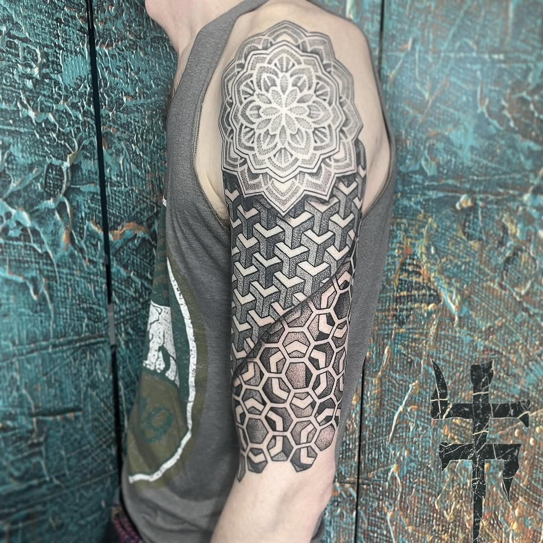 Continuation of this geometry sleeve - Always fun working with patterns. Thank you so much! #geometry #geometrictattoos #sheffieldtattoo #sleeve #dotwork #dotworktattoo #dotworkers